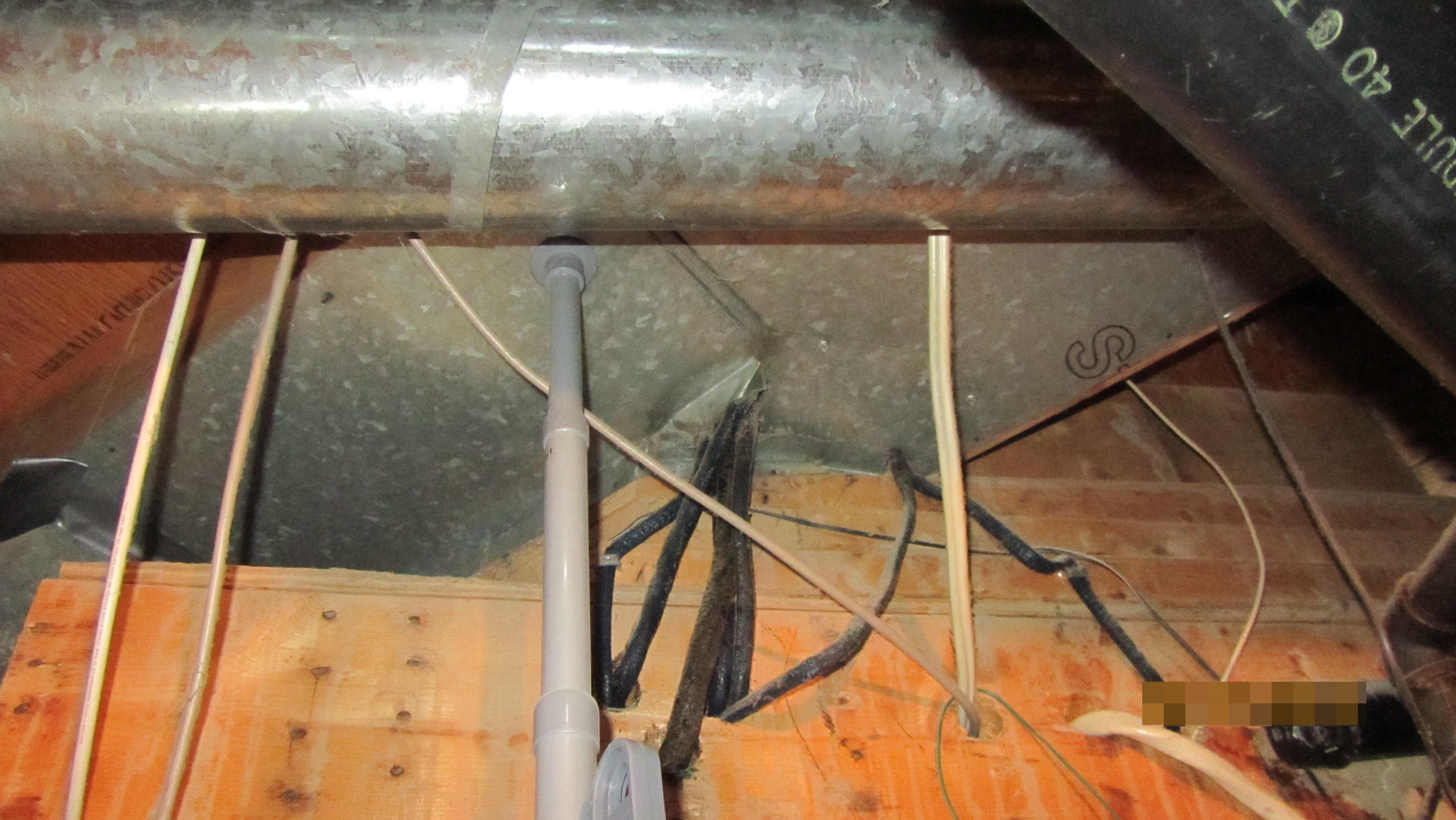 Live wires through heat ducting, shock andfire hazard