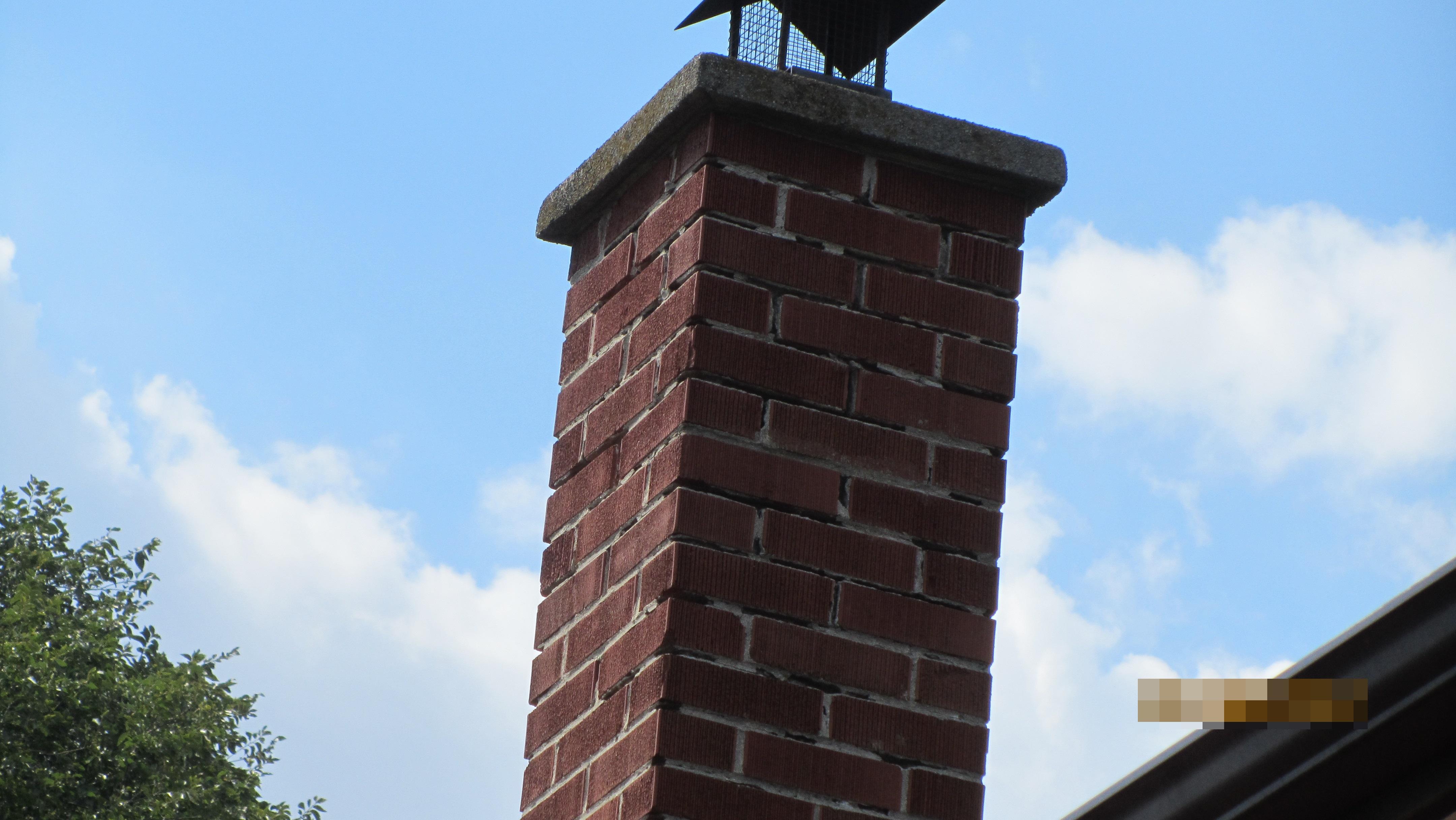 Masonry chimney mortar missing, safety hazard